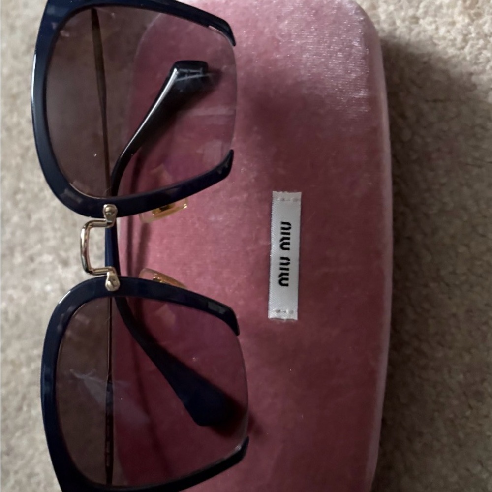 Miu Miu Dark Blue Sunglasses with Gold Accents